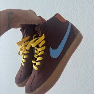 Nike Brown Sneakers with Yellow Laces and Blue Swoosh